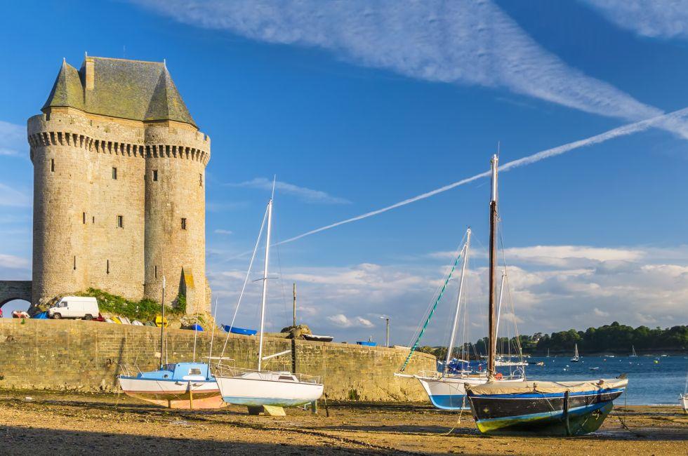 Solidor Tower with boats and yachts laying aground during low tide, Saint-Malo 