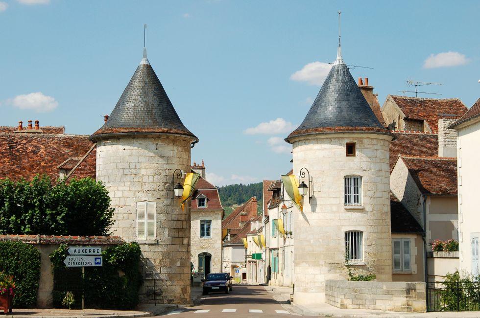 Two Romanesque towers in famous wine village Chablis, France.