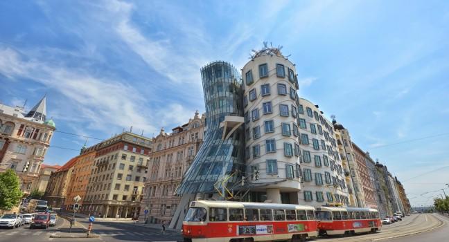 PRAGUE - JULY 24: view of the Dancing House, designed by Vlado Milunic and Frank Gehry on July 24, 2013 in Prague. The building has become an important tourist site since it's completion in 1996. 