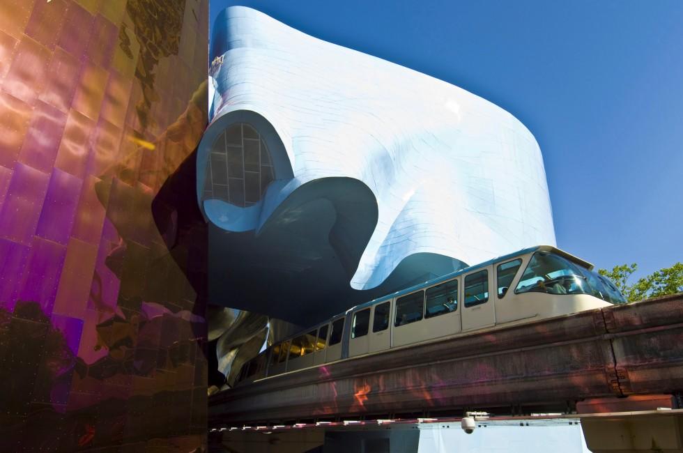Experience Music Project (EMP) with Seattle monorail running through on August 1, 2011.  EMP was designed by Frank Gehry and houses many rare artifacts from popular music history.; 