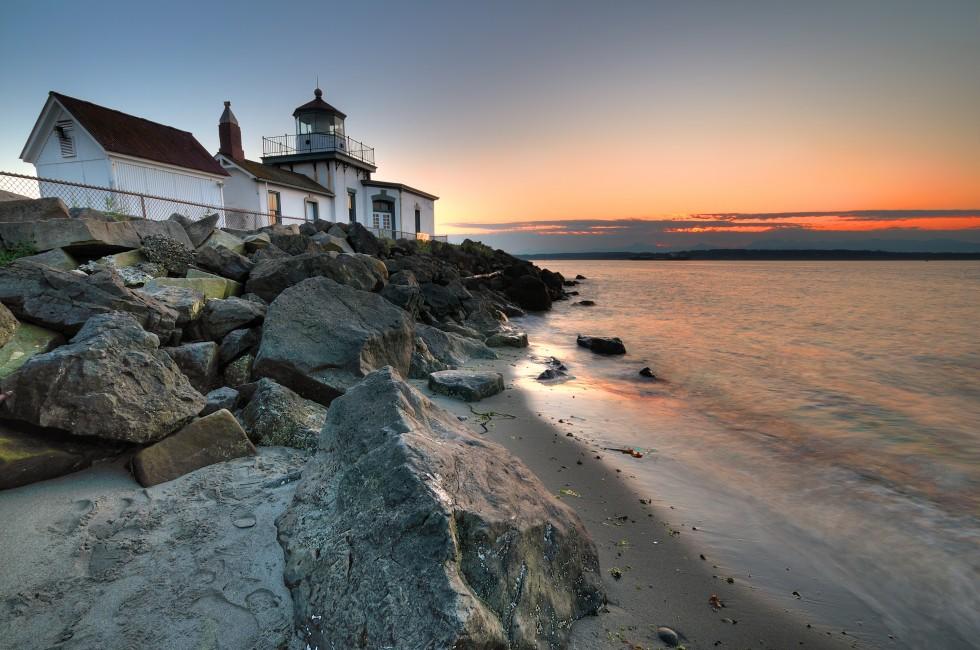 West Point lighthouse at Discovery park Seattle at dusk.