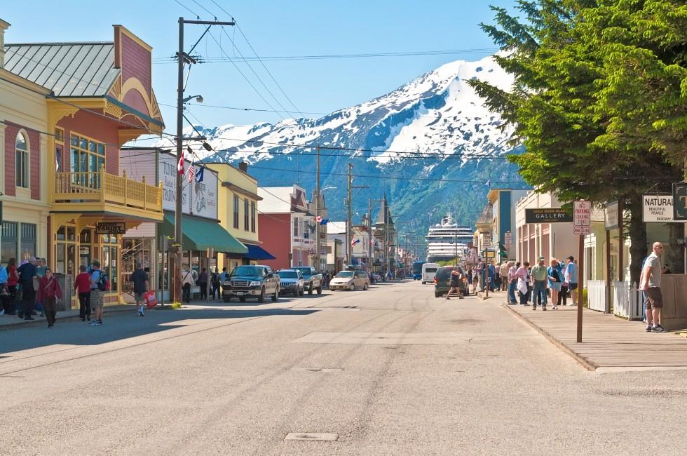 SKAGWAY, AK - JUNE 2: Main shopping district in the small town of Skagway on June 2, 2009.  During the summer months, Skagway receives more than 800,000 visitors from cruise ships