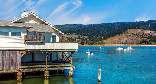 California house built on stilts in water. Location: Bolinas Lagoon near San Francisco.