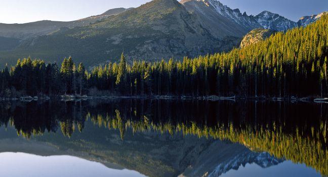A sunrise reflection at Bear Lake in Rocky Mountain National Park.; 