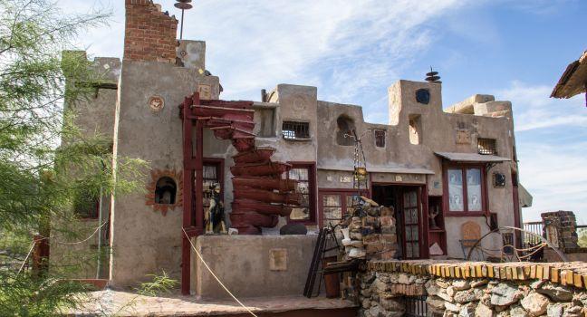 PHOENIX,ARIZONA,USA-NOVEMBER 30: Tourists visit the Mystery Castle in Phoenix on November 30, 2013. The castle was built in the 1930s and 40s by Boyce Gully for his daughter.; 