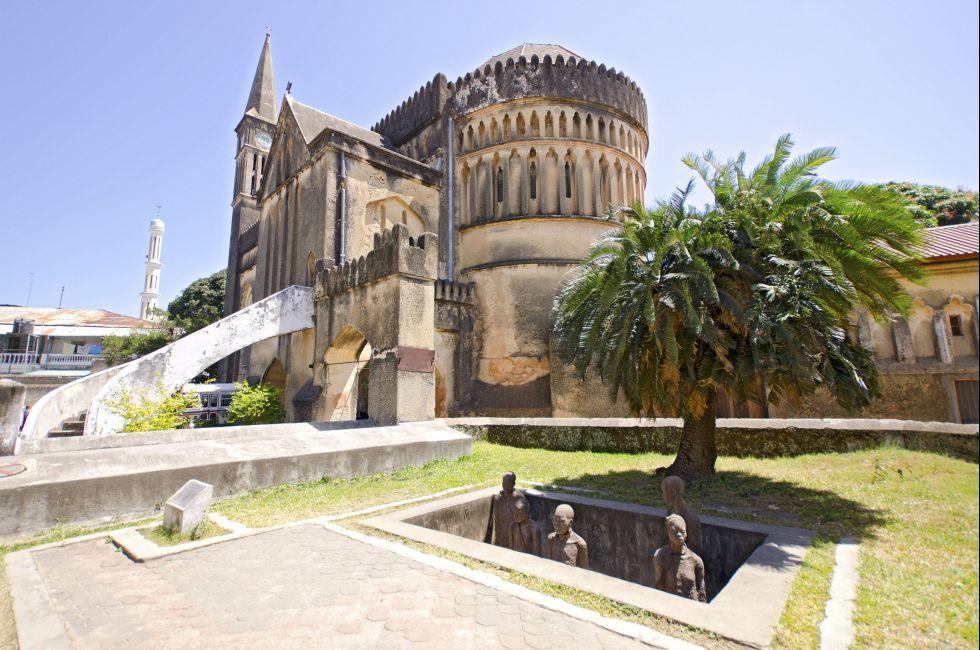Slave Market Memorial with Church in the Background in Stone Town on Zanzibar Island - Tanzania