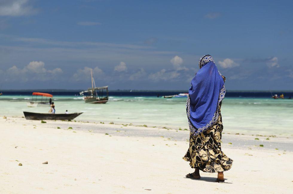Tanzania, Ethnic women on the beautiful beach on the  Zanzibar island