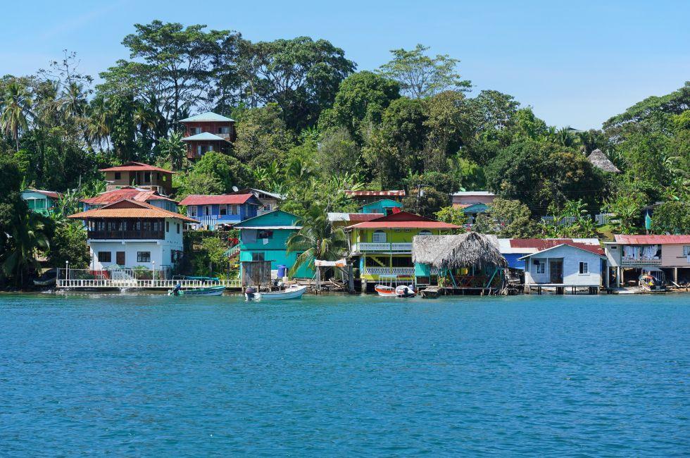 Caribbean village of Old Bank with tropical vegetation on the coast of Bastimentos island, Bocas del Toro, Panama.