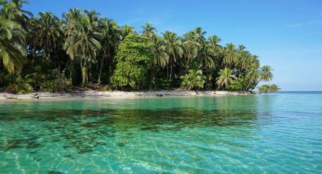 Pristine Caribbean island with lush vegetation in the marine park of Bastimentos, Cayos Zapatilla, Bocas del Toro, Panama.