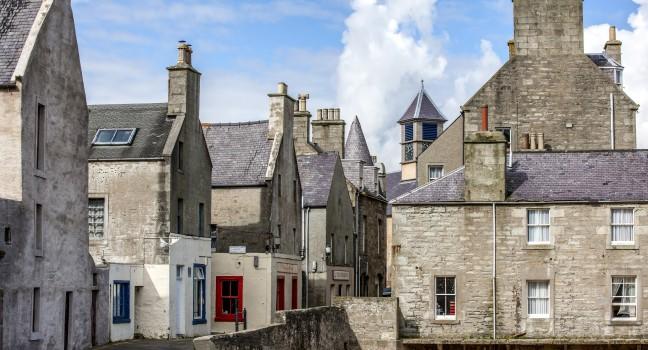 Lerwick, Shetland, Scotland, United Kingdom. Street View of the old city of 400 years (17th century) with its characteristic granite houses in northern Europe.