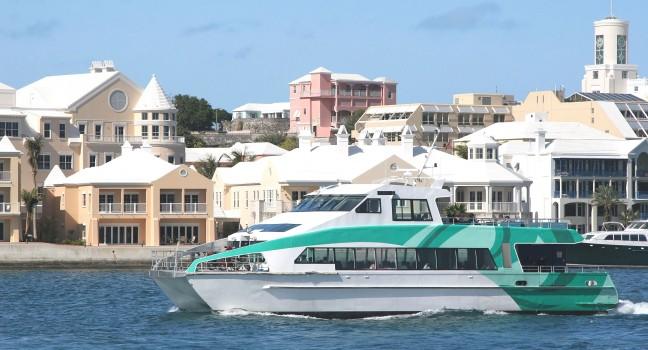 A passenger ferry running along the waterfront in Hamilton, Bermuda; 