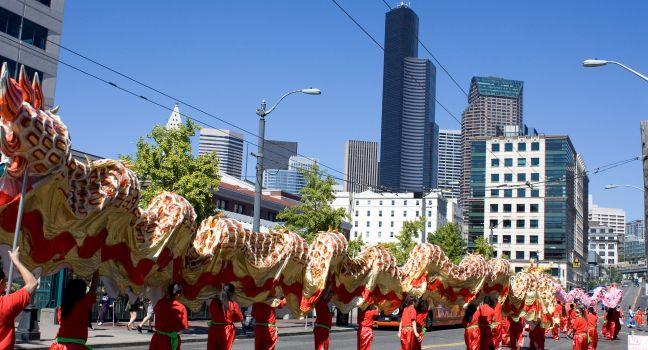 A Chinese association was celebrating their anniversary with dragon dancing around China Town/Inerternational District of Seattle, Washington State, USA