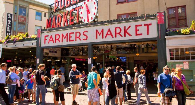 Pike Place Market is a public market overlooking the Elliott Bay waterfront in Seattle, Washington, United States. The Market opened August 17, 1907, and is one of the oldest continually operated public farmers' markets in the United States. It is a place 