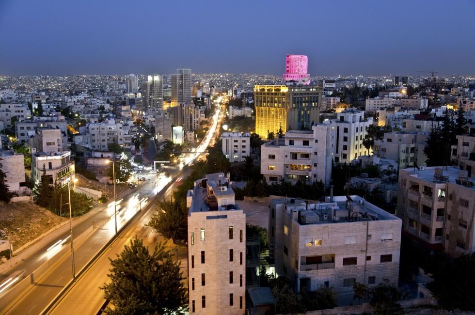 Amman,Jordan - April 29 : City lights after the sunset on April 29,2013 in the west side of the capital &quot;Amman&quot; and Le Royal hotel with in the background.