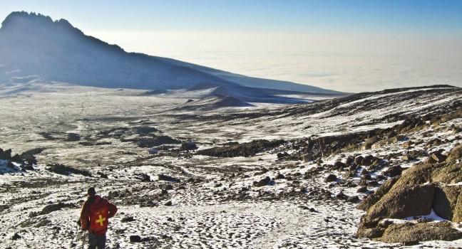 climbing the Mount Kilimanjaro, the highest mountain in Africa (5892m)