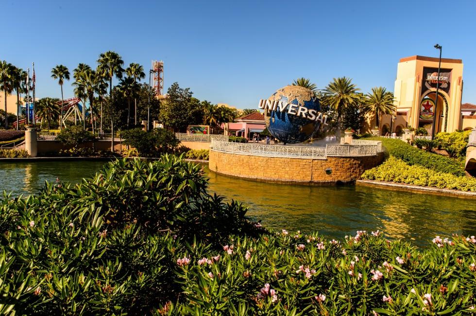 ORLANDO, USA - DECEMBER 19, 2013: Universal Logo in front of Universal Studios Orlando. Universal Studios Orlando is a theme park resort in Orlando, Florida.; 