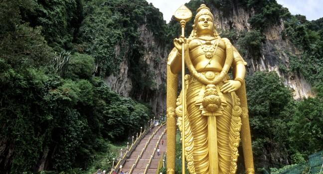 Climbing Hindu pilgrimage to Batu Caves, near Kuala Lampur, Gombak, Southeast Asia, Malaysia